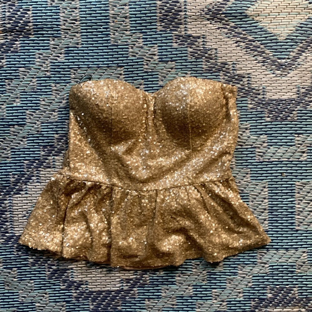 Women’s strapless cocktail party top. Gold  sequence , ruffle. . Size M.